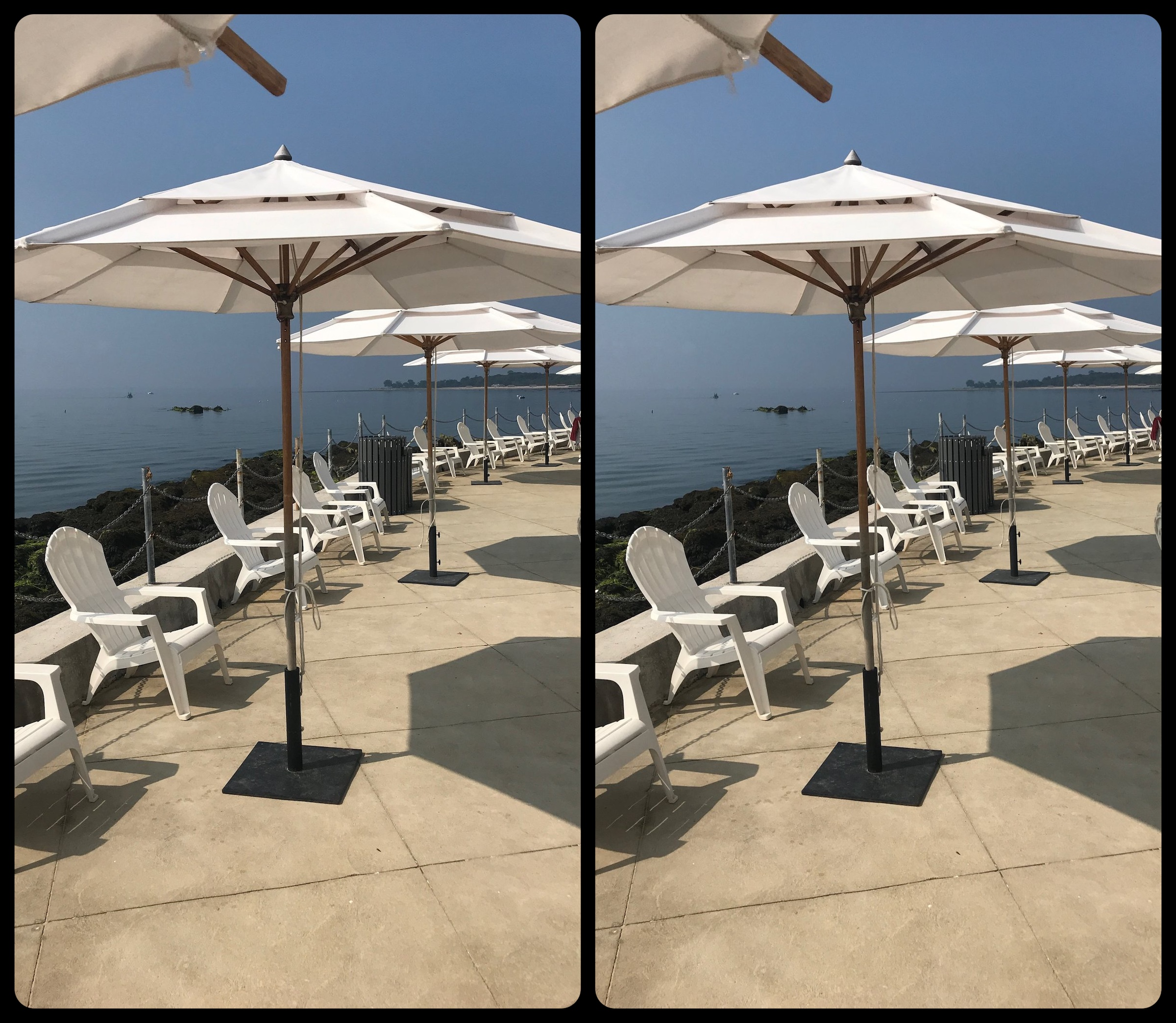 Umbrellas by the water, stereo pair